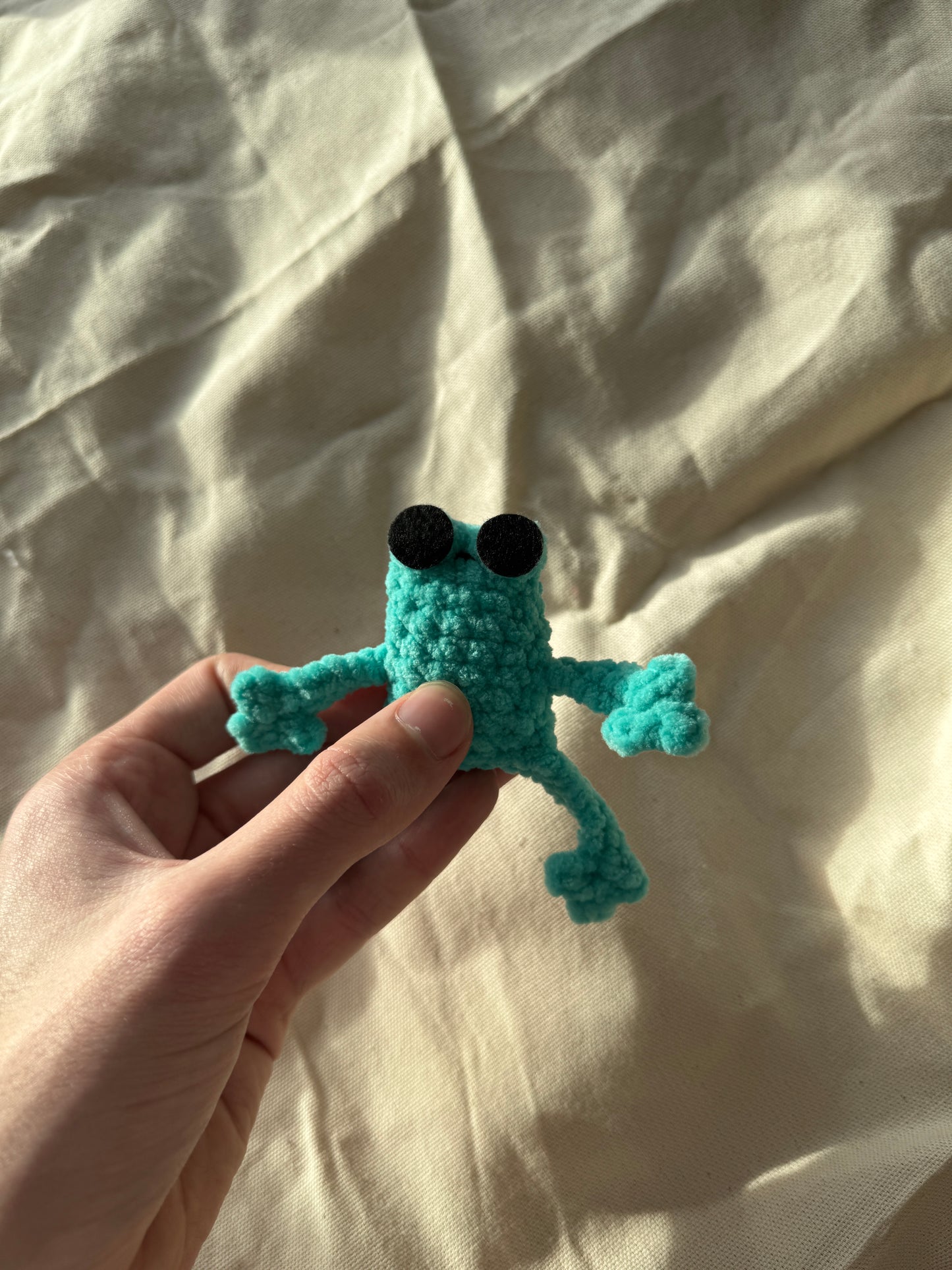 Handmade mini leggy frog plushie